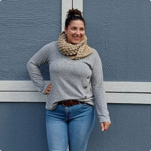 Woman in cute fall sweater and scarf
