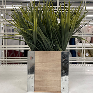 Dd’s store shelf with affordable Fall artificial plant