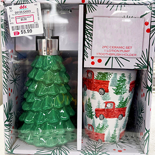 An image displaying a festive Christmas ceramic lotion and toothbrush holder set from a dd's store